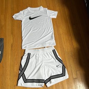Nike outfit shirt size small, shorts size medium